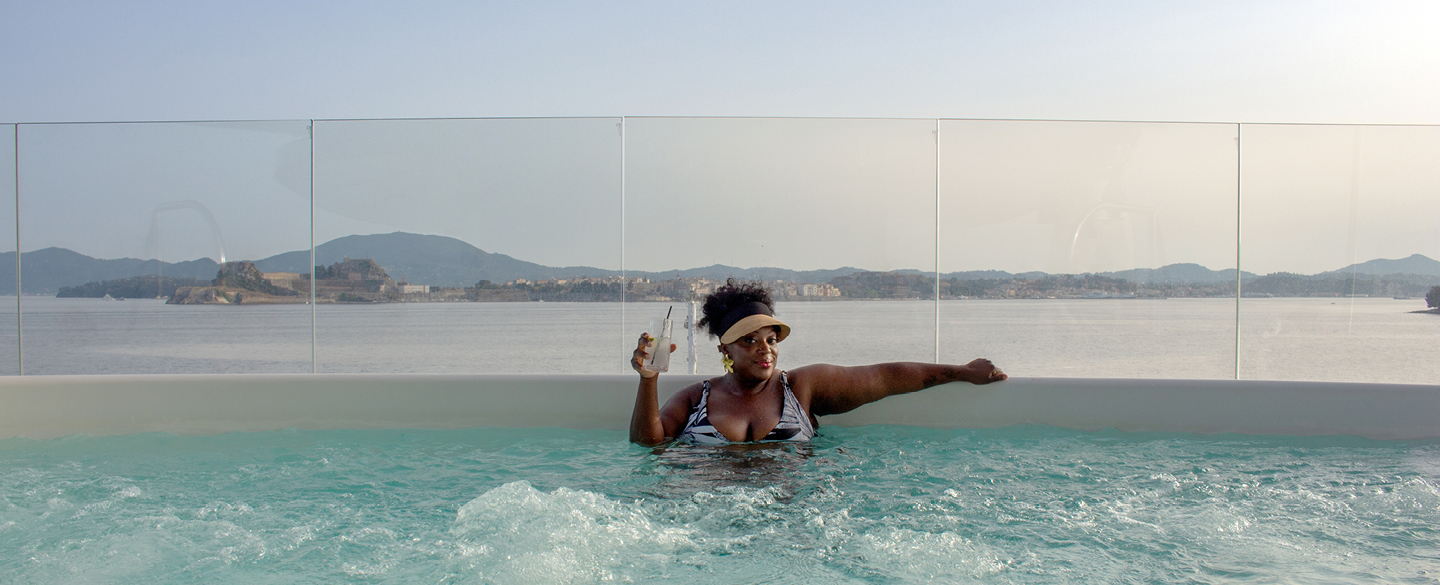 Judi enjoying the hot tubs on Emerald Azzurra