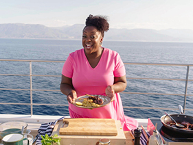 Judi Love with a meal made on her Emerald Azzurra culinary cruise